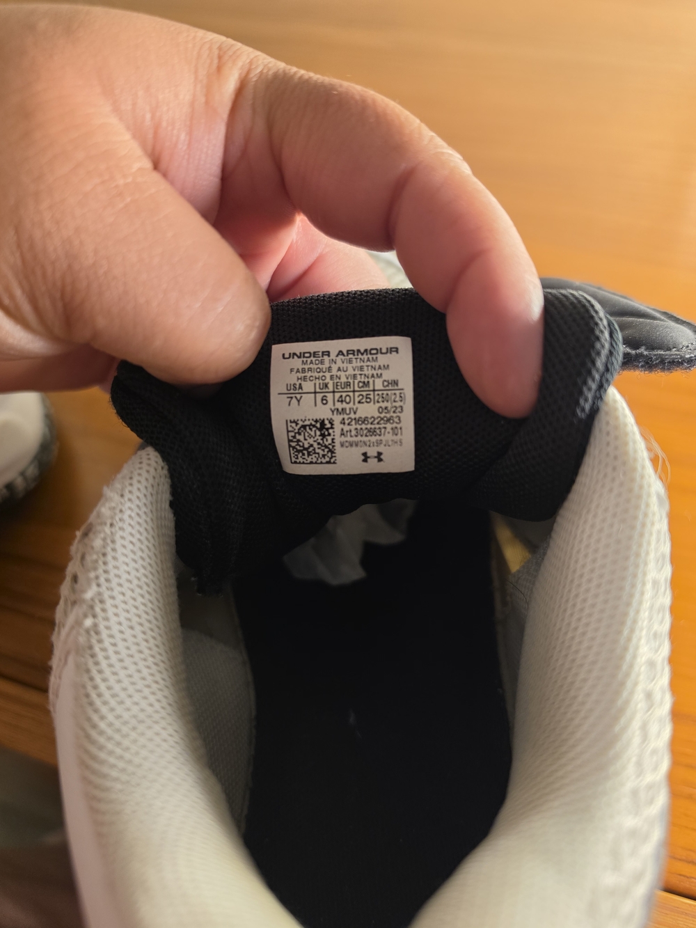 Under Armour Kids' White and Black Athletic Shoes